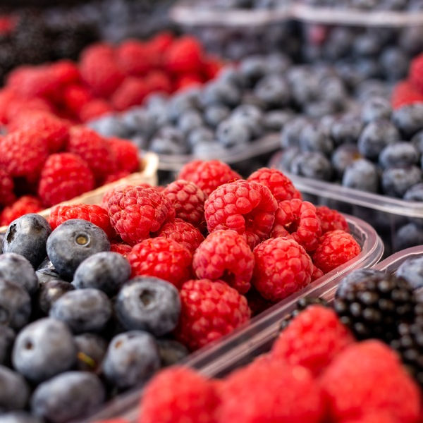 Fresh fruit, beautifully packaged and displayed.